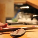 Cutting fish for Sashimi