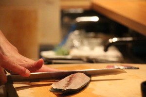 Cutting fish for Sashimi