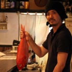 The chef at Ippo presenting a fish